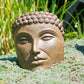 Small Buddha Face in Ancient Stone