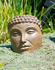 Small Buddha Face in Ancient Stone