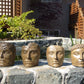 Small Faces in Ancient Stone